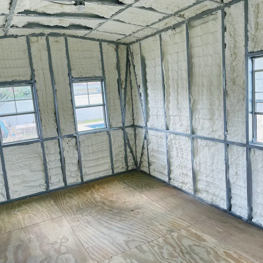 Closed-cell spray foam insulation applied to wall cavities in a residential project in Rocky Mount